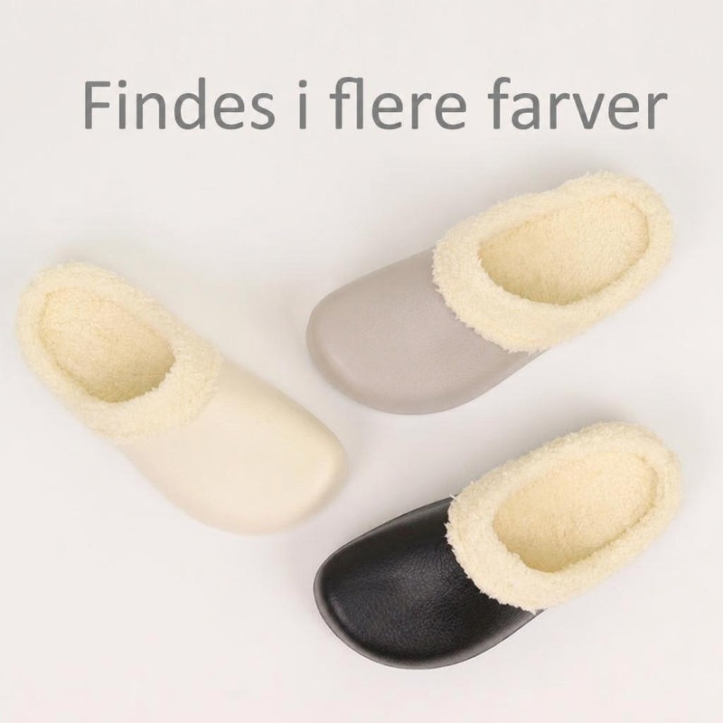 Forede cloud-tofflor i sort, beige og grå med blød inderside