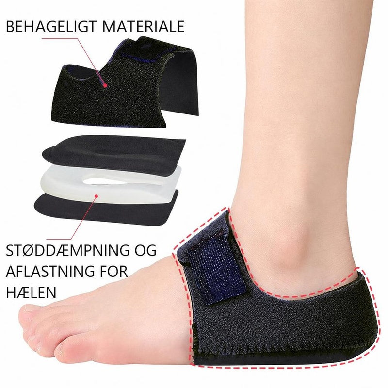 Sort hælkop med velcrolukning og u-formet gelindlæg på fod