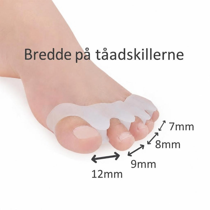 Gennemsigtig tåspreder på fod med afstandsmål ved tæerne