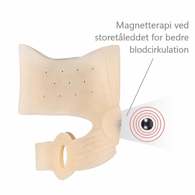 Beige hallux valgus-tåstøtte med tåseparator og synlig magnet
