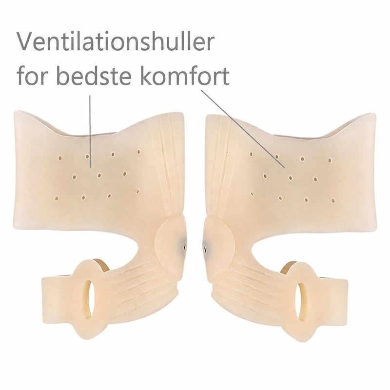 To beige stortåstøtter med tåseparatorer og små ventilationshuller