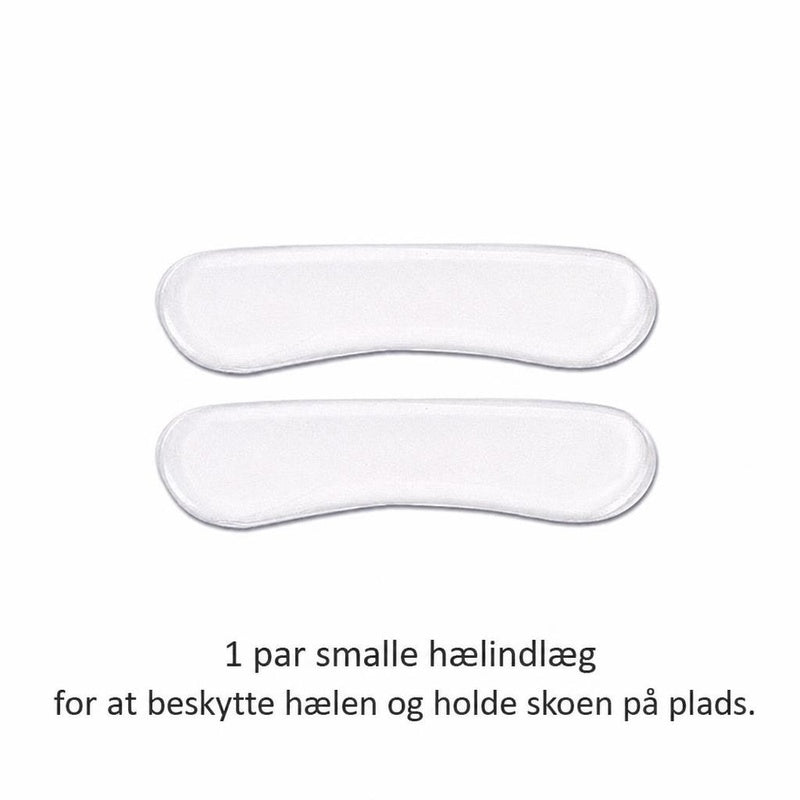 Et par smalle hvide hælindlæg i silikone på hvid baggrund