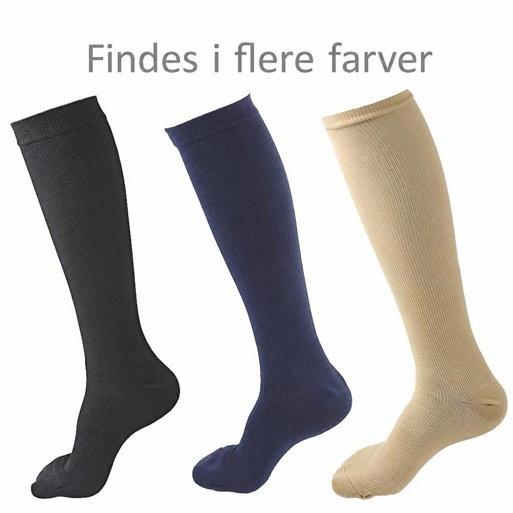 Tre knælange støttestrømper i sort, navy og beige