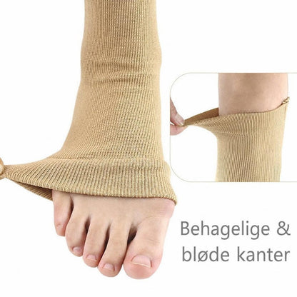 Beige støttestrømpe med åben tå, lynlås og blød kant