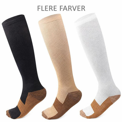 Støttestrømper i sort, beige og hvid med brune hæl- og tåpartier