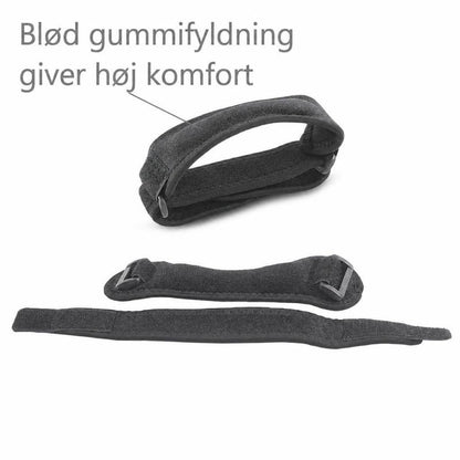 Sort knæstøttebånd i stof med blød gummipolstring og velcrolukning