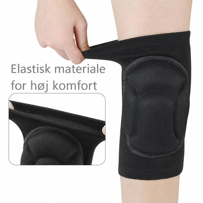 Sort juniorknæbeskytter med polstret knæpude i elastisk materiale
