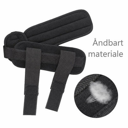 Sort stabiliserende ankelstøtte med stropper, skinner og detalje af materiale