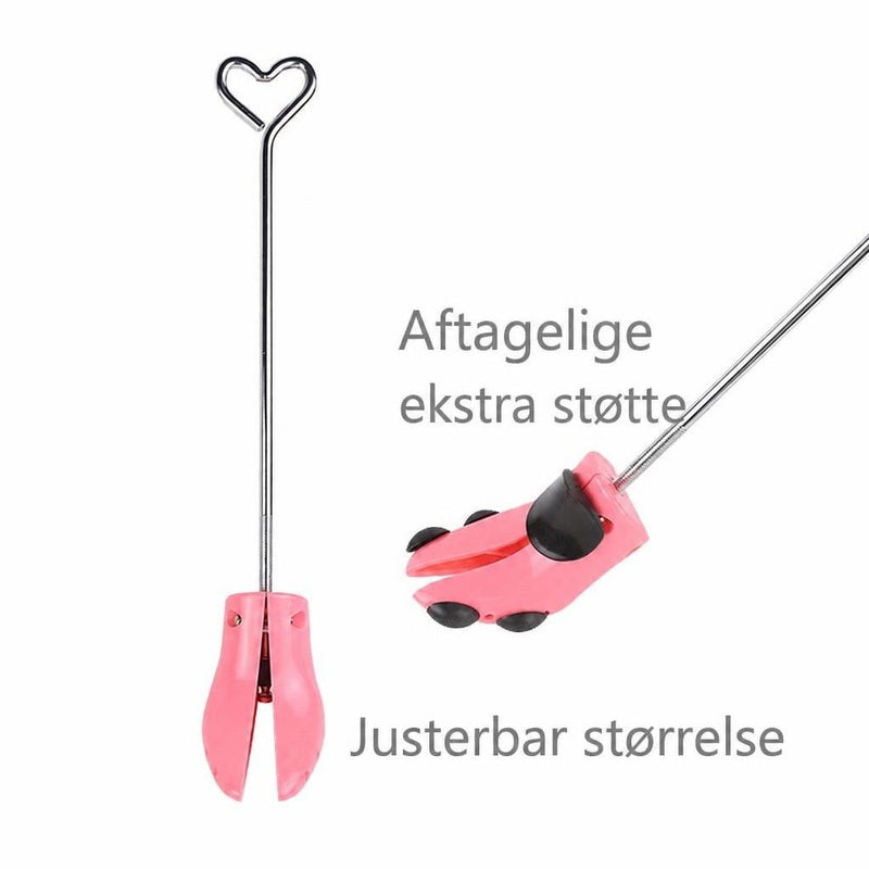 Lyserødt støvleblok med metalstang og hjerteformet håndtag