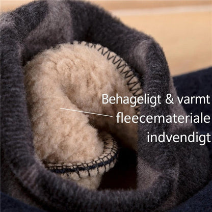 Grå tøffel med blødt fleecefor og synlige kantsting