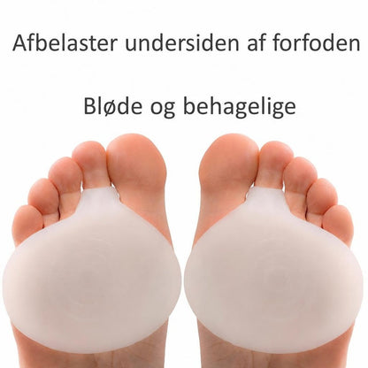 Bløde silikone forfodspuder placeret under begge fødder