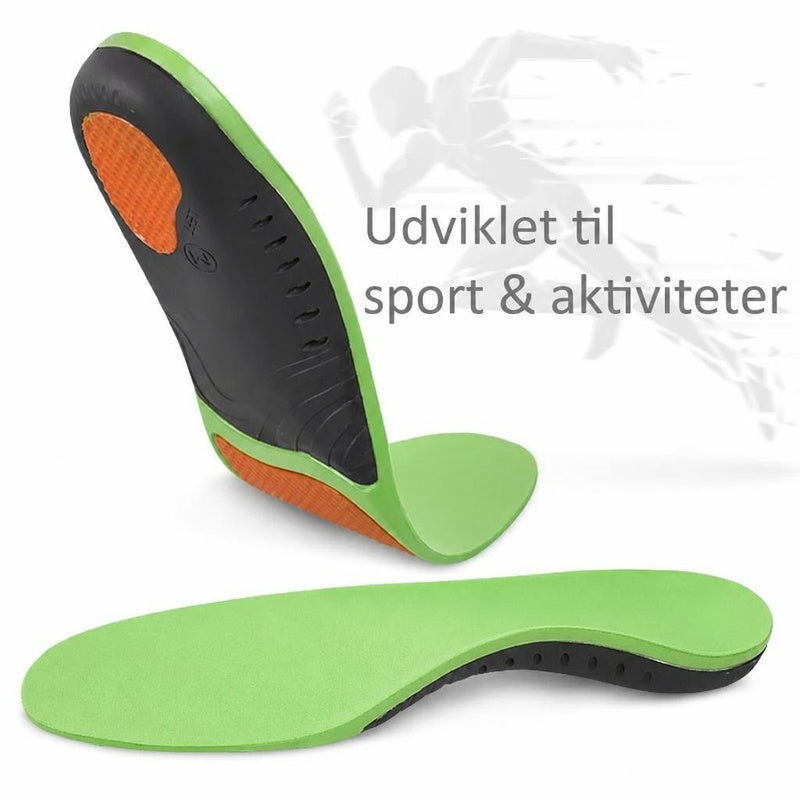 Grønne sportsindlægssåler, en flad og en bøjet med sort underside