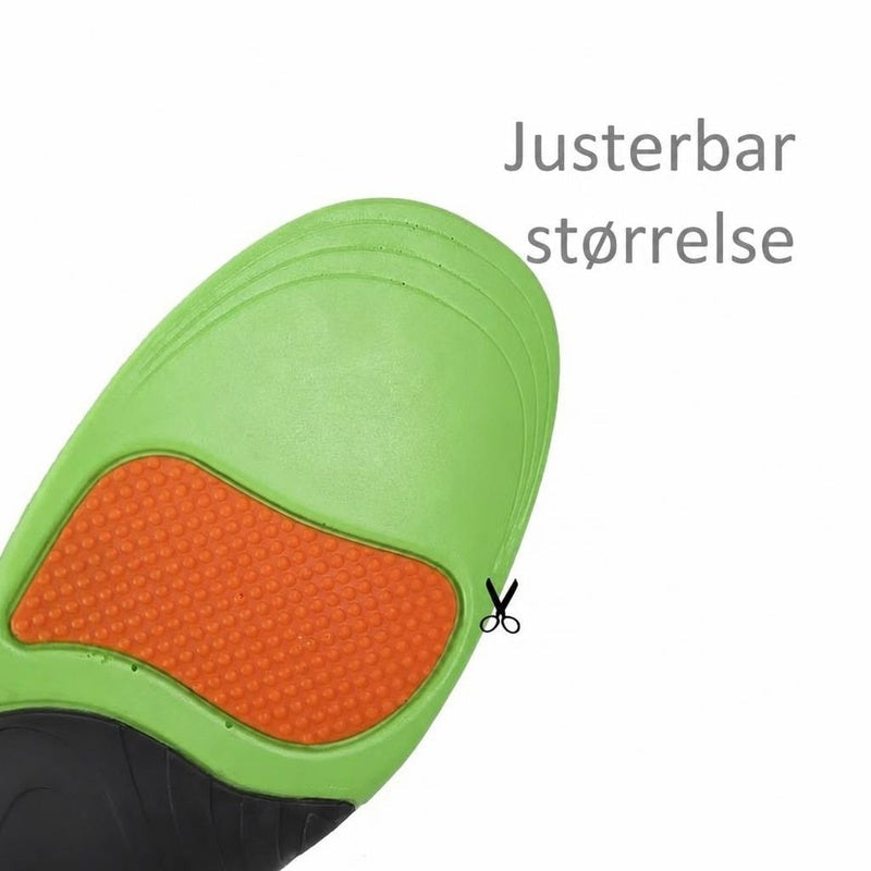Grøn skosål med orange støttefelt og klippelinjer til justering