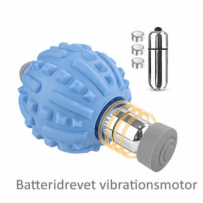 Blå pigget massagebold med udtaget vibrationsmotor og knapcellebatterier
