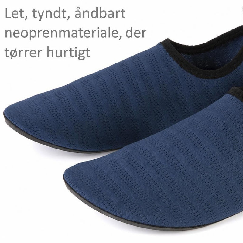 Blå Ibiza badsko i tekstureret neopren med sort kant