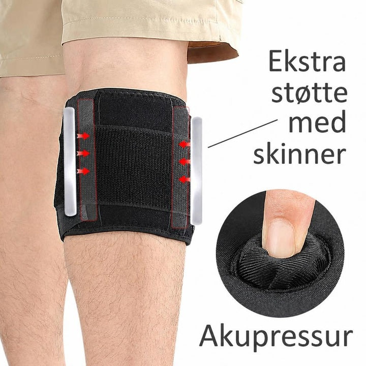 Sort kompressionsstøtte på lår med sideskinner og akupressurpude