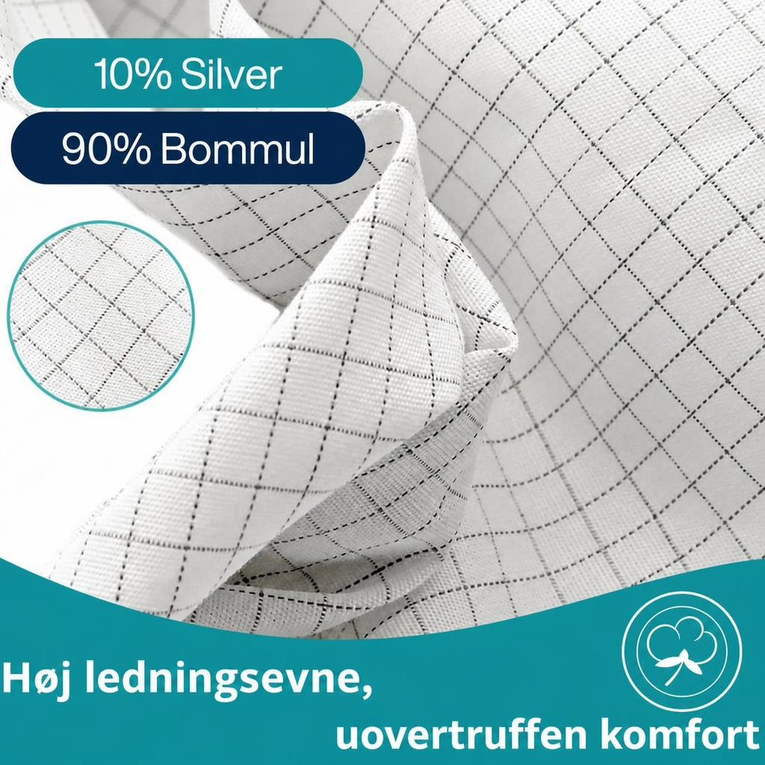 Hvidt jordingspudebetræk med sort ternmønster og tekst om 10% sølv, 90% bomuld