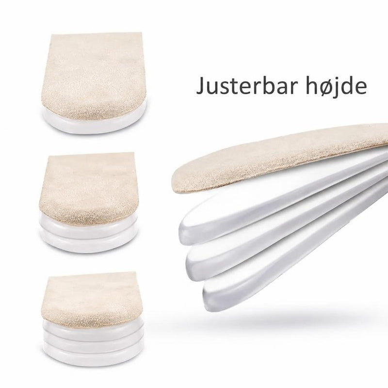 Justerbart hælindlæg med beige top og hvide lag i forskellige højder
