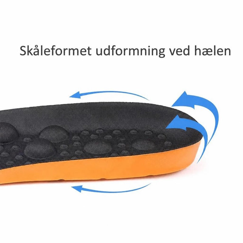 Sort og orange skosål med massageknopper og skålformet hæl pilet markeret