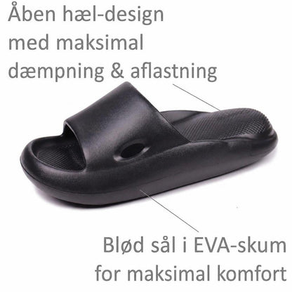 Sort Bounce-badesandal med åben hæl, bred rem og tekstureret fodseng