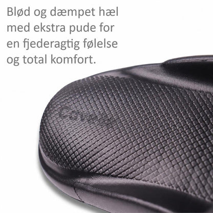 Sort Bounce-tøffel med tekstureret overflade og afrundet front