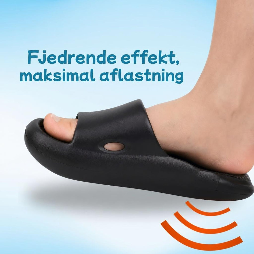 Sort Bounce-toffel på fod med grafiske fjederlinjer