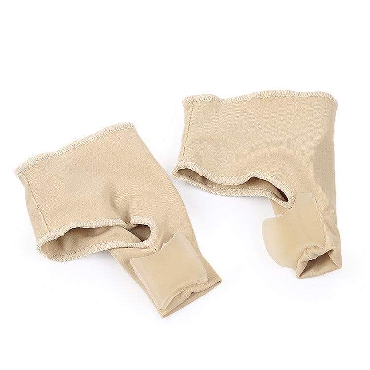 To beige hallux valgus-støtter med tåseparatorer i blødt stof
