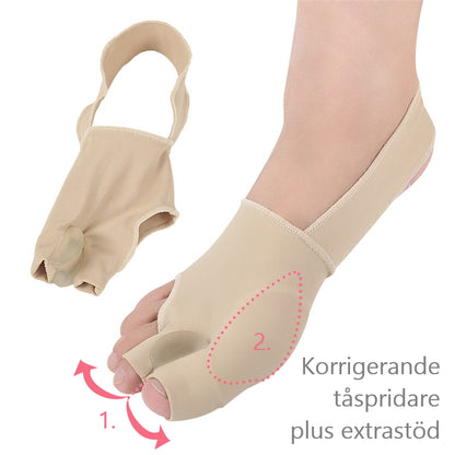 Beige stortåstøtte med tåseparator i blød tekstil på fod
