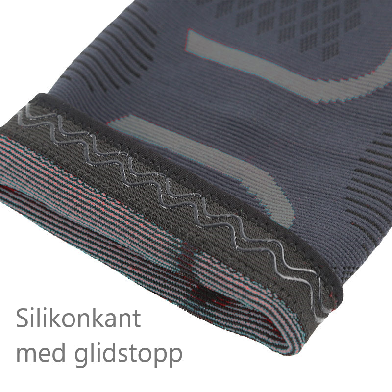 Grå kompressions-knæstøtte med silikonekant og skridsikkert mønster