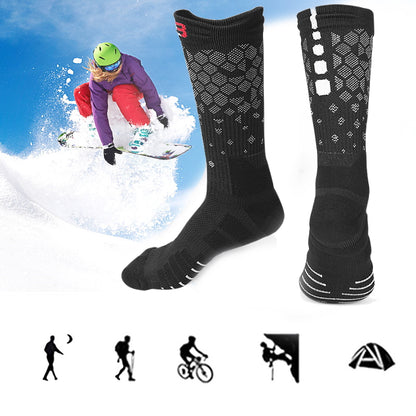 Sorte varme knæstrømper med mønster, vist sammen med snowboardmotiv