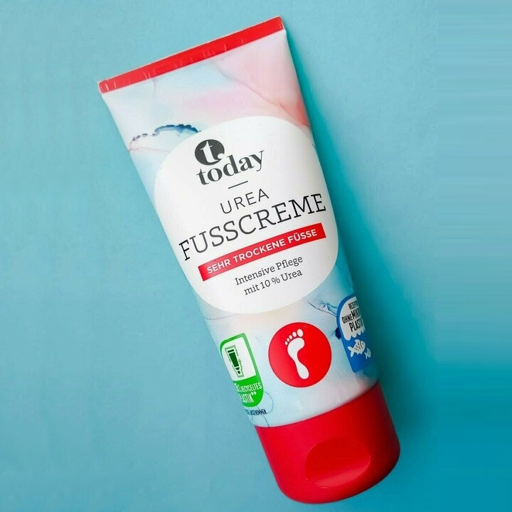 Today urea fodcreme i tube med rød kapsel på turkis baggrund
