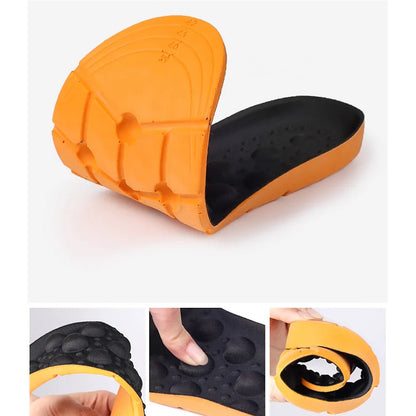 Orange og sorte fleksible helsåler med massageknopper og størrelsesmarkeringer