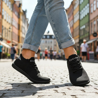 Sorte Ventra barfodssko på brostensgade med opsmøgede jeans