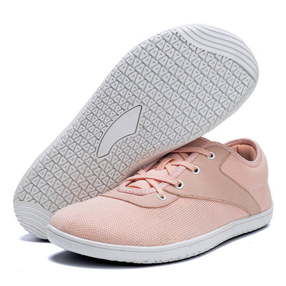 Rosa barfodssneakers med snørebånd og hvid mønstret sål