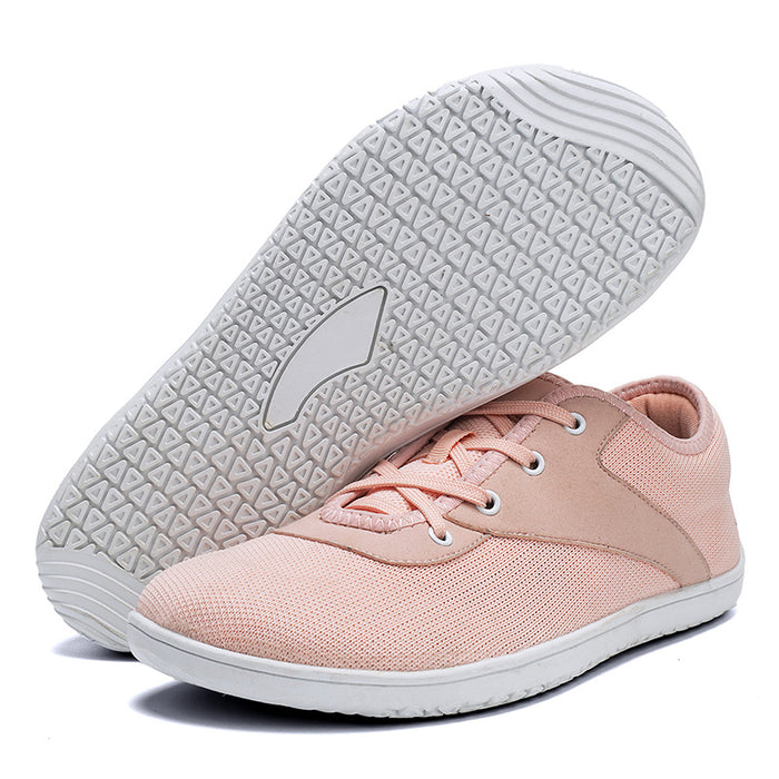 Rosa barfodssneakers med snørebånd og hvid mønstret sål